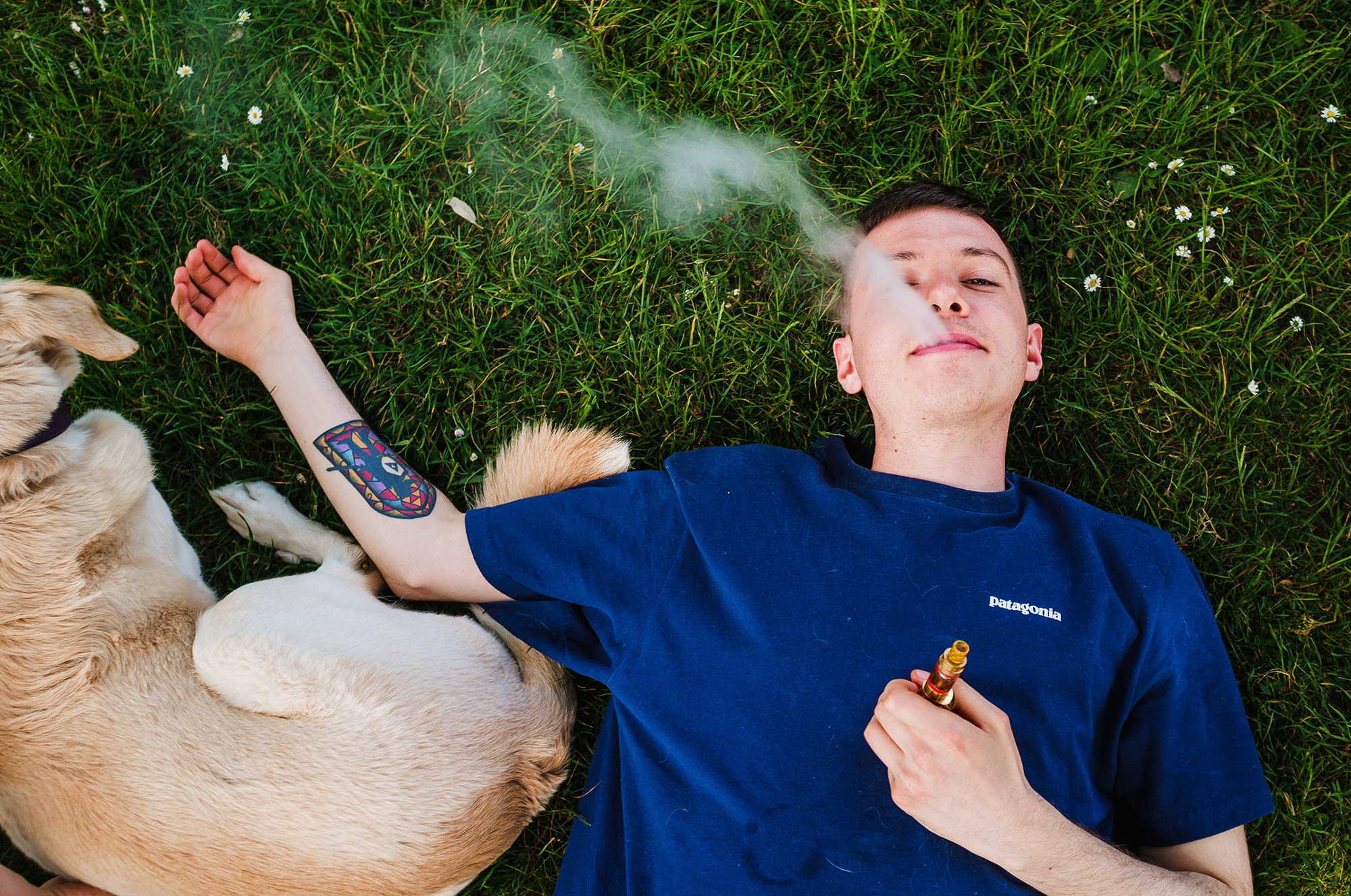 fuji x100 portrait of a young man with dog