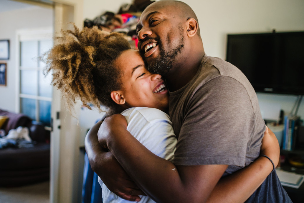 father and daughter silly hug family photograoher brighton and hove worthing