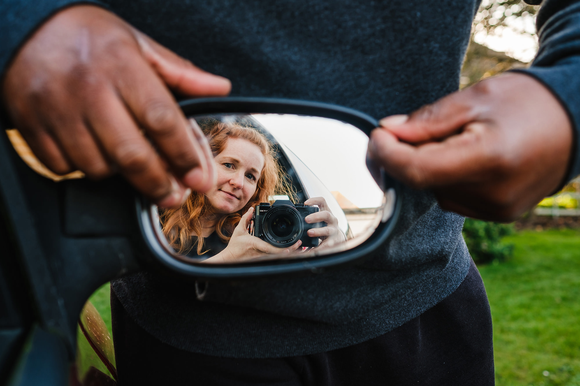 fixing my mirror selfie