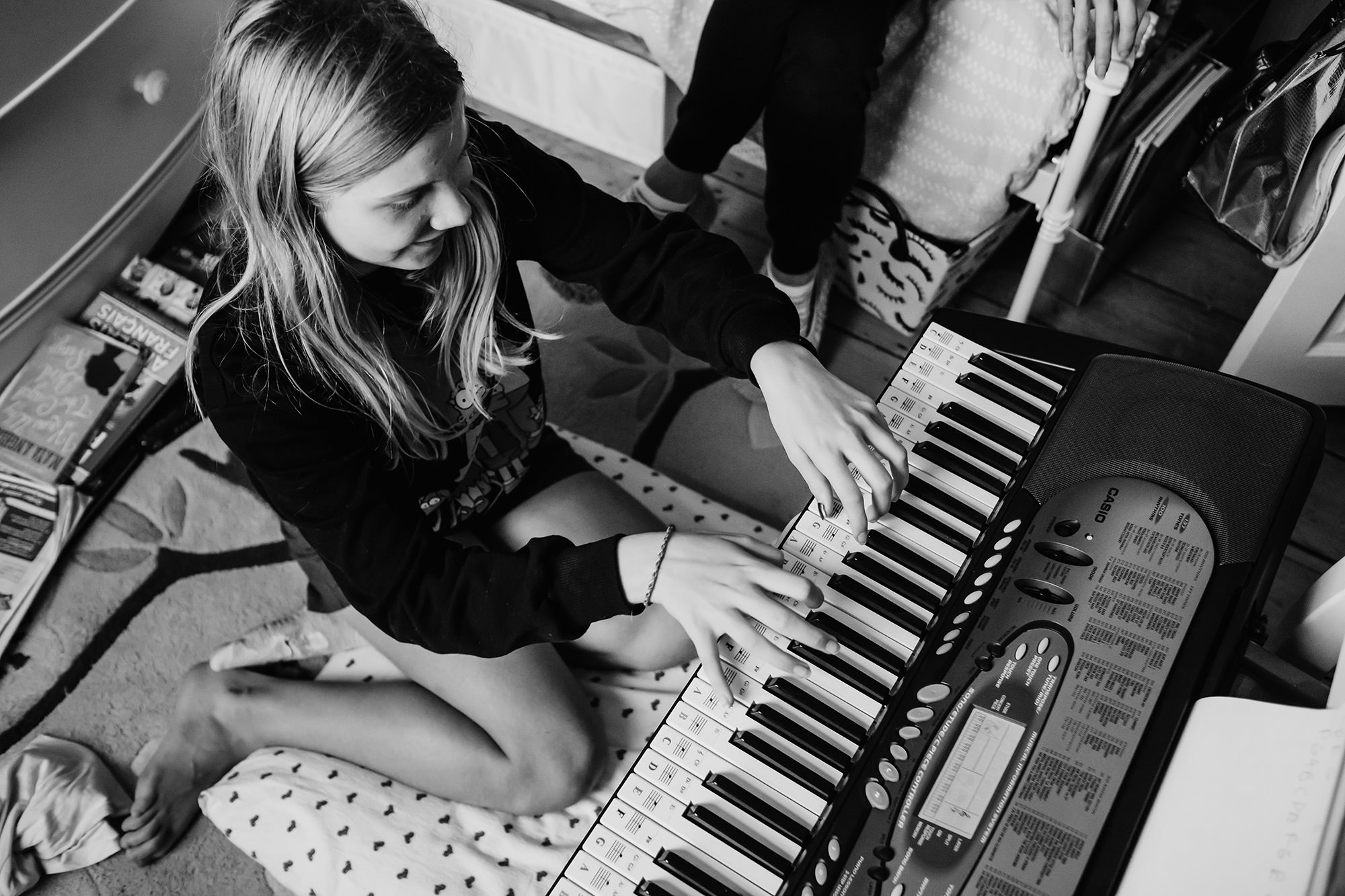 playing piano teenage girl