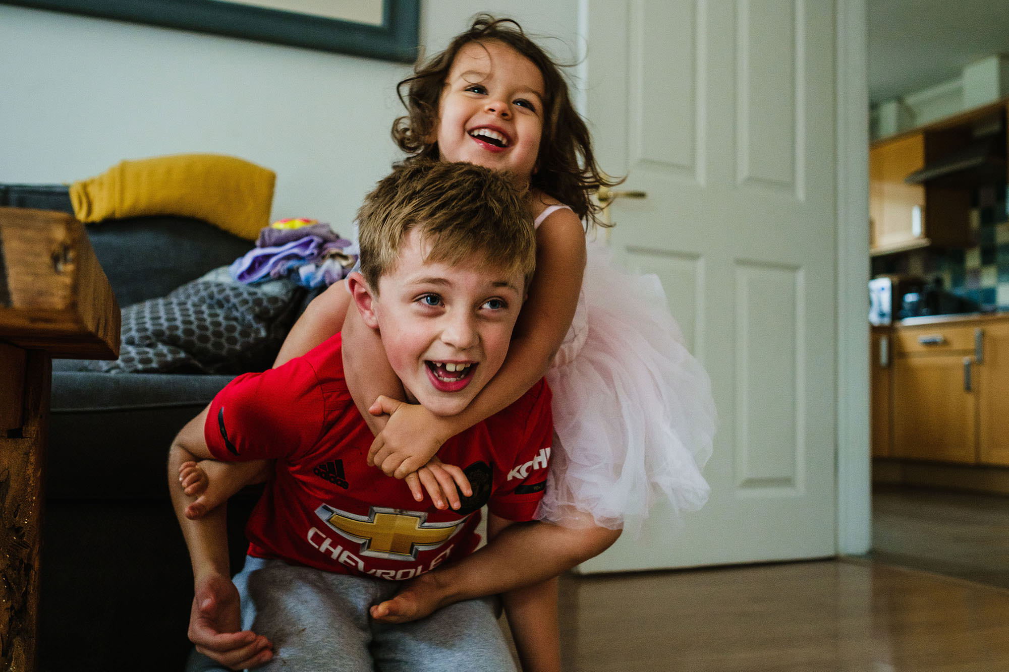 brother and sister at home