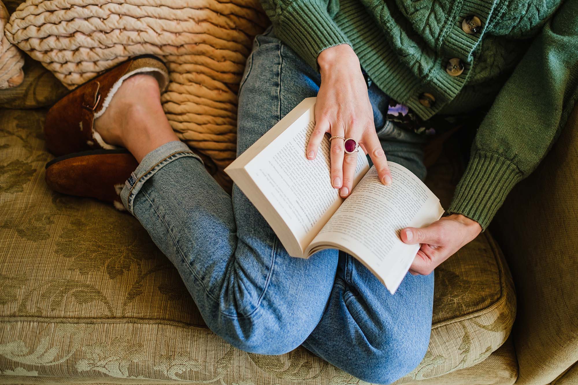 close up of book open on a lap