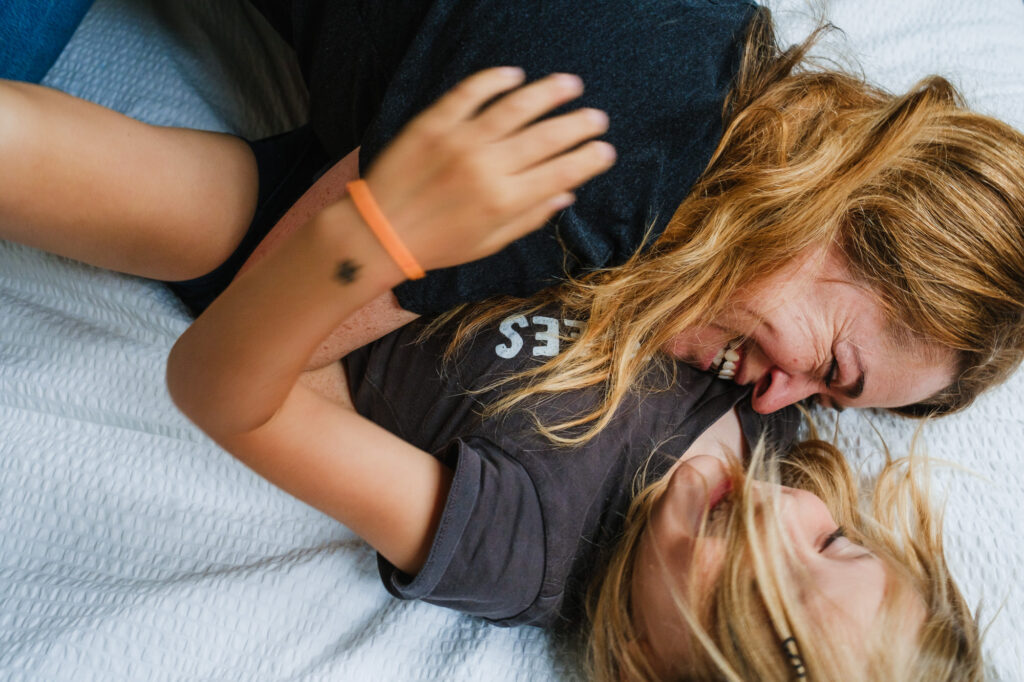 mum and daughter cuddling connection moment